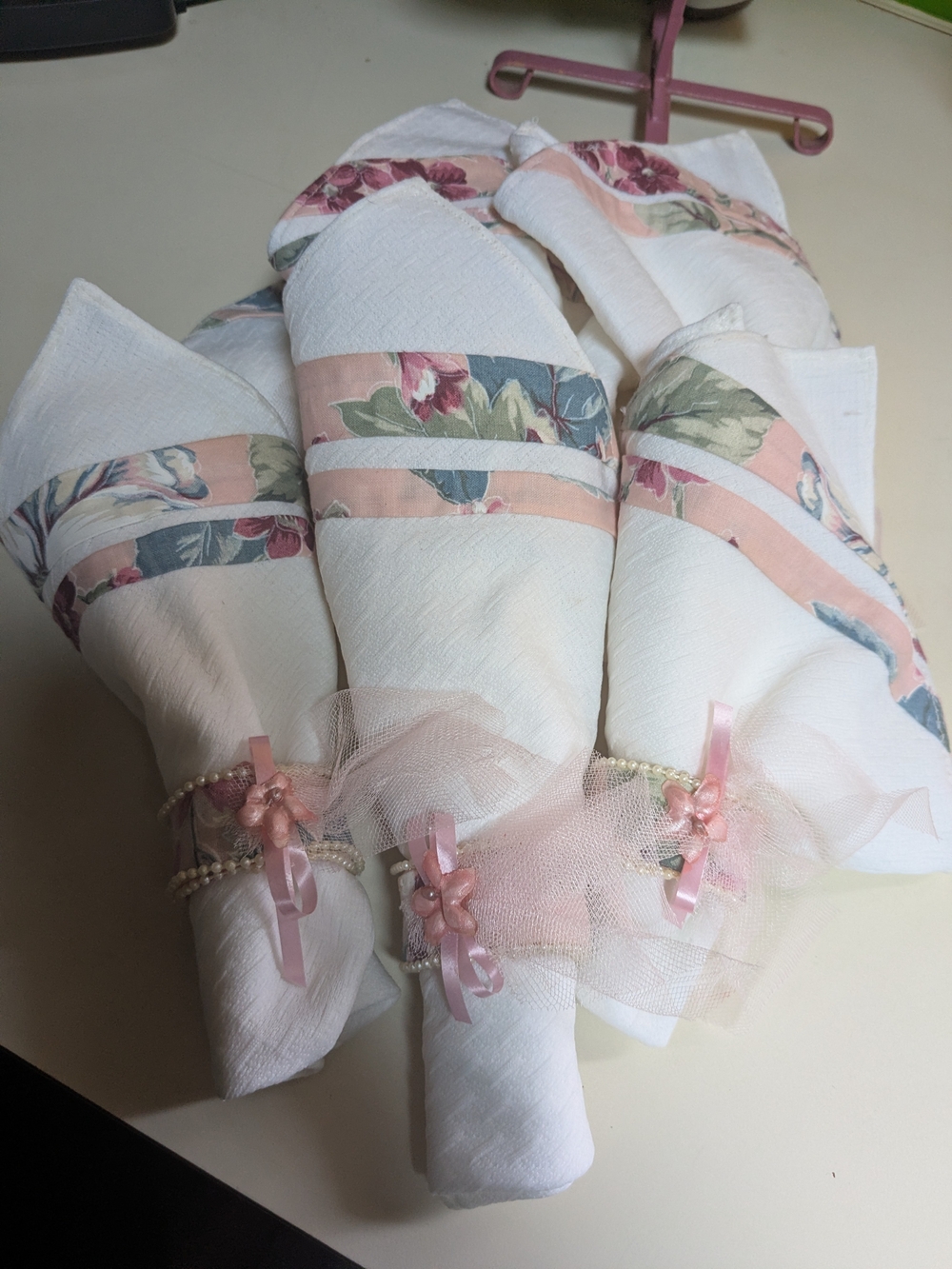 Set Of 6 White Floral Trim Napkin Rings with Pink Tulle Bows With White Linen.